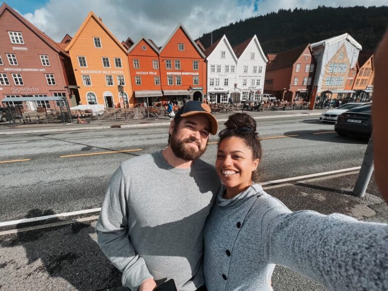 Is Bergen Worth Visiting? 14 The auther and her partner standing in front of Bryggn wharf